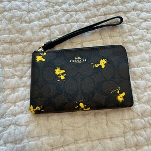 Coach x peanuts signature wristlet